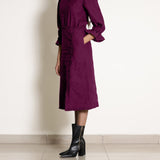 Left View of a Model wearing Warm Mulberry A-Line Frilled Cotton Skirt