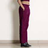 Right View of a Model wearing Warm Mulberry Frilled Straight Pant