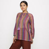 Left View of a Model wearing Multicolor Handwoven Cotton Peasant Top