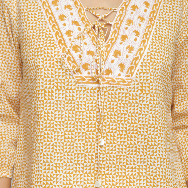 Front Detail of a Model wearing Mustard Ditsy Block Printed Cotton Straight Top