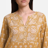 Front Detail of a Model wearing Mustard Block Print Princess Line Midi Cotton Dress