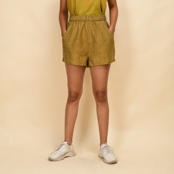 Front View of a Model wearing Mustard Gold 100% Cotton Short Shorts