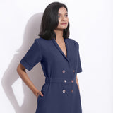 Front Detail of a Model wearing Navy Blue Cotton Waffle Knee Length Coat Dress