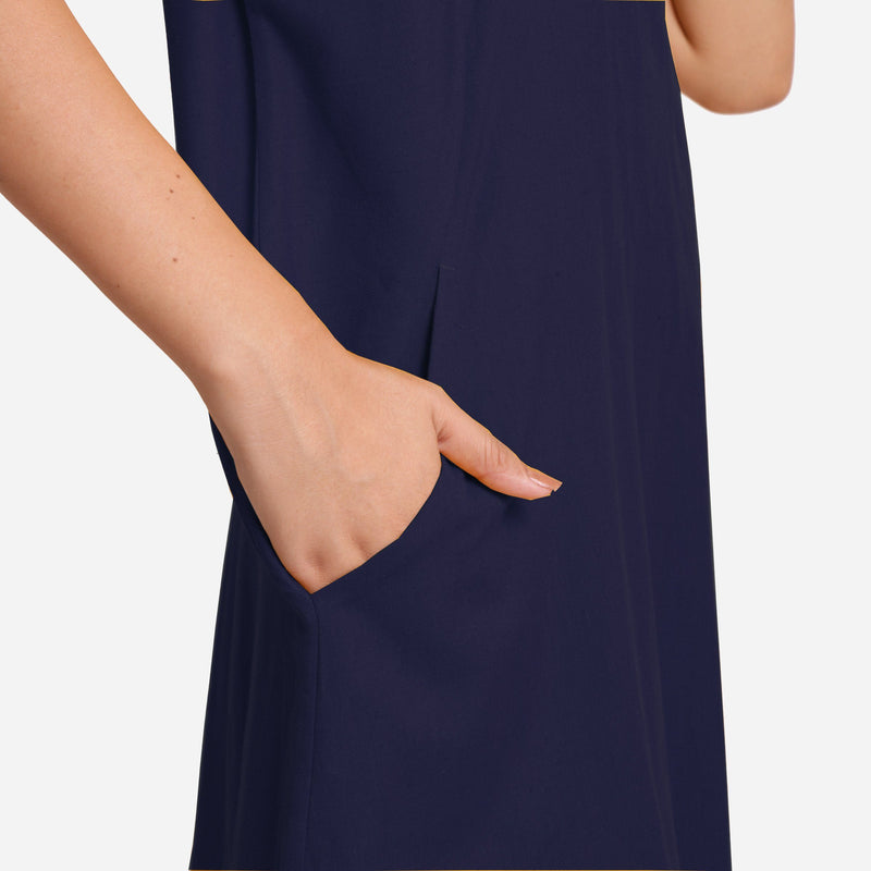 Right Detail of a Model wearing Navy Blue Cotton Flax Anti-Fit Dress