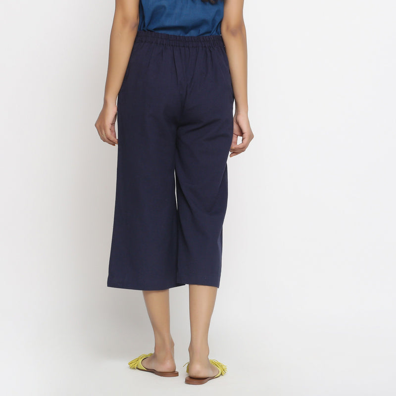 Back View of a Model wearing Solid Navy Blue Cotton Flax Culottes