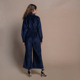 Back View of a Model wearing Navy Blue Cotton Velvet Bootcut Jumpsuit