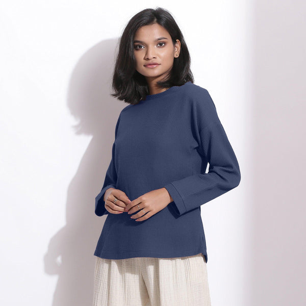 Front View of a Model wearing Navy Blue Cotton Waffle Drop Shoulder Top