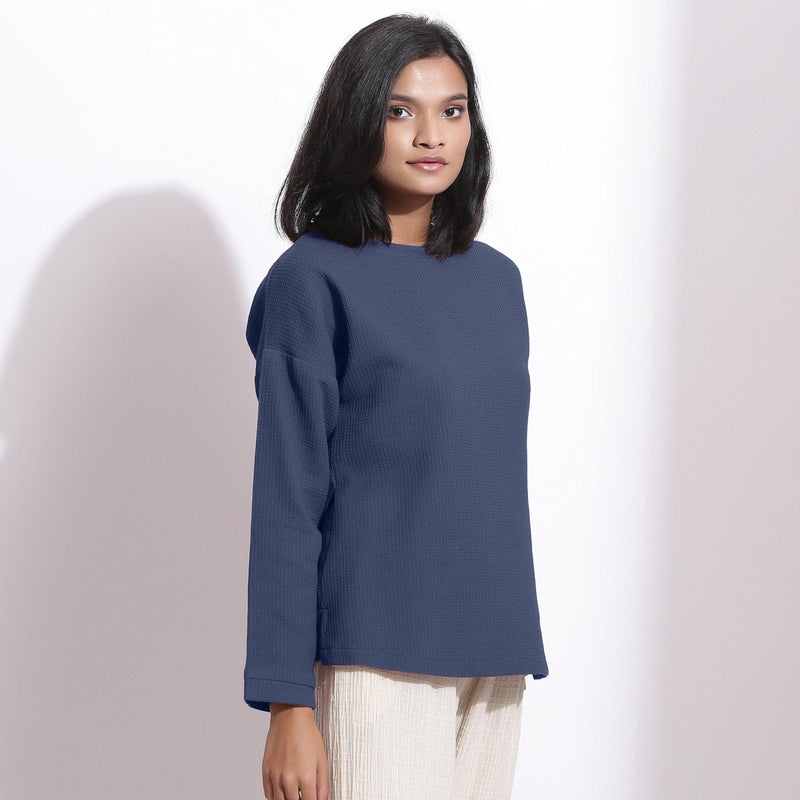 Right View of a Model wearing Navy Blue Cotton Waffle Drop Shoulder Top