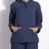 Front Detail of a Model wearing Navy Blue Cotton Waffle Hoodie Sweatshirt