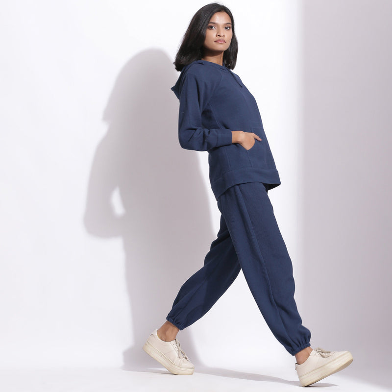 Right View of a Model wearing Navy Blue Cotton Waffle Hoodie and Jogger Pant Set