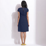Back View of a Model wearing Navy Blue Cotton Waffle V-Neck Dress