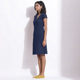 Left View of a Model wearing Navy Blue Cotton Waffle V-Neck Dress