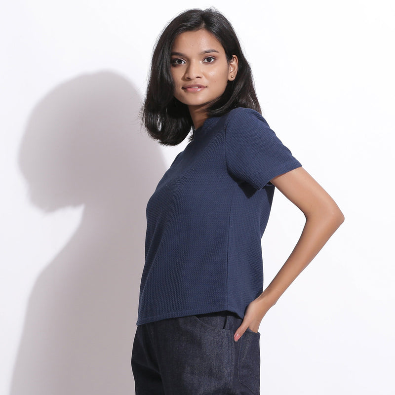 Left View of a Model wearing Navy Blue Cotton Waffle Woven T-Shirt