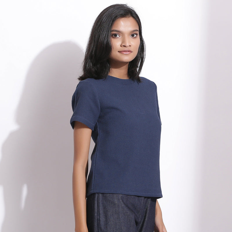 Right View of a Model wearing Navy Blue Cotton Waffle Woven T-Shirt