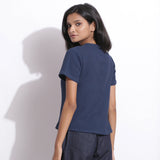 Back View of a Model wearing Navy Blue Cotton Waffle Woven T-Shirt