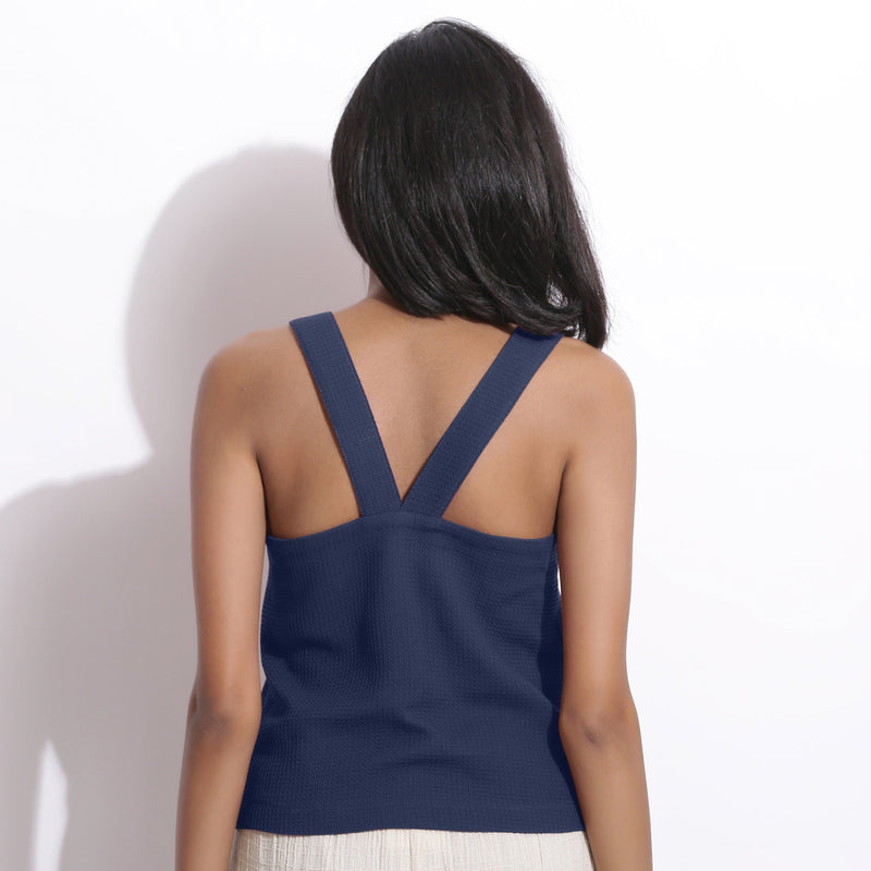 Back View of a Model wearing Navy Blue Honeycomb Waffle Strap Top