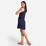 Left View of a Model wearing Navy Blue Patch Pocket Round Neck Dress