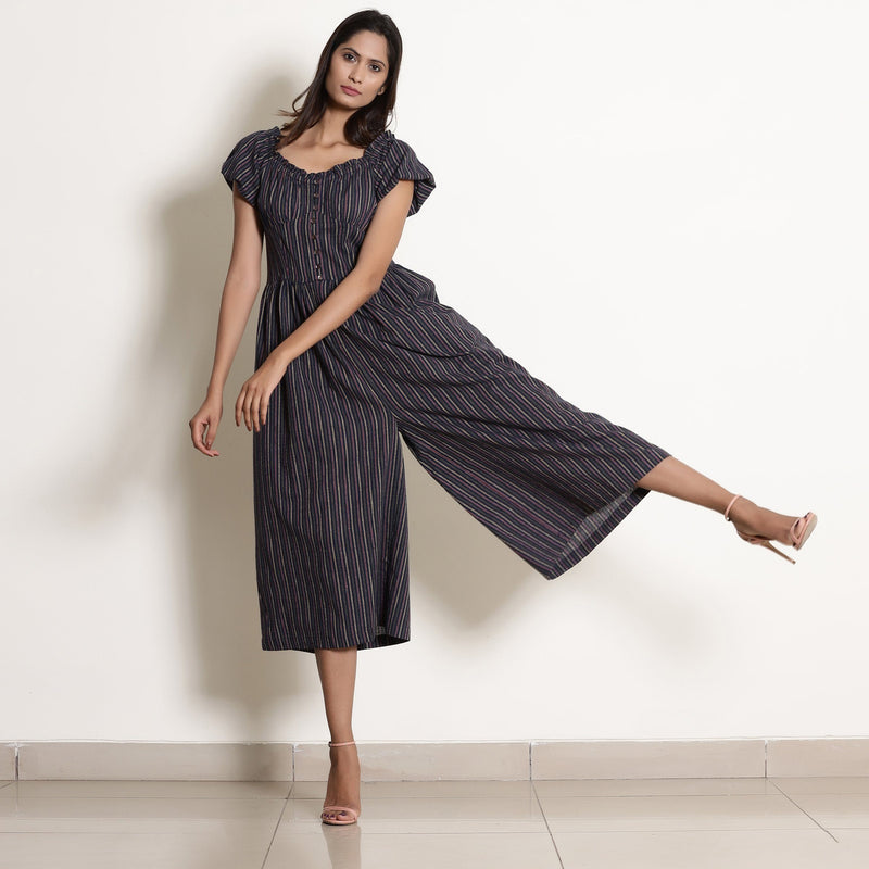 Front View of a Model wearing Navy Blue Striped Frilled Neck Flared Jumpsuit