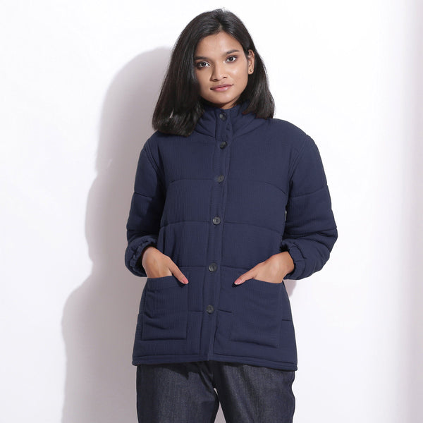 Front View of a Model wearing Navy Blue Waffle Quilted Puffer Jacket