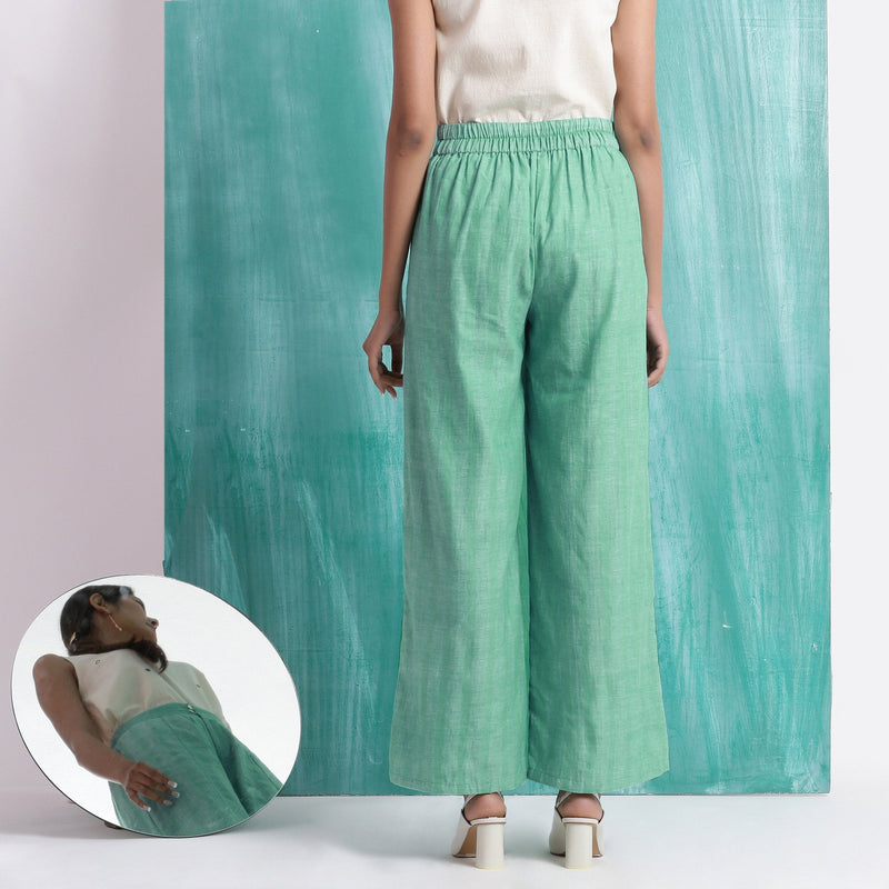 Back View of a Model wearing Ocean Green 100% Cotton Wide-Legged Pant