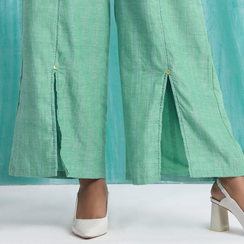 Close View of a Model wearing Ocean Green 100% Cotton Elasticated Mid-Rise Wide Legged Pant