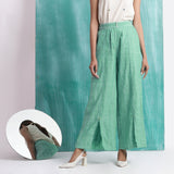Front View of a Model wearing Ocean Green 100% Cotton Elasticated Mid-Rise Wide Legged Pant
