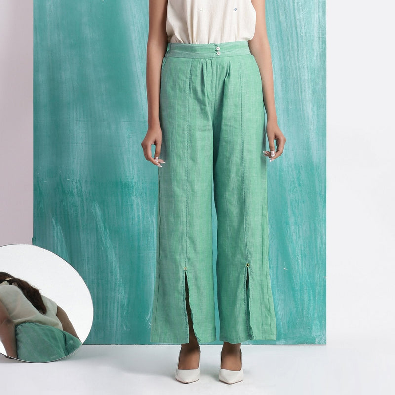Front View of a Model wearing Ocean Green 100% Cotton Elasticated Mid-Rise Wide Legged Pant