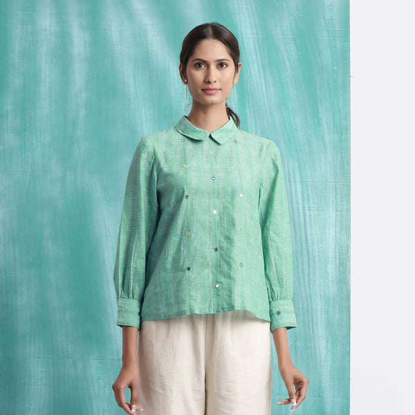 Front View of a Model wearing Ocean Green Handspun 100% Cotton Mirror Work Blouse Top