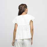 Back View of a Model wearing Off-White Cotton Schiffli Yoked Top