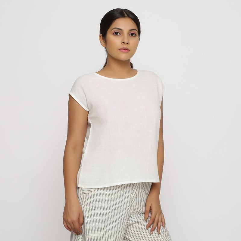 Right View of a Model wearing Off-White 100% Cotton Round Neck Cap Sleeve Top