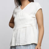 Left Detail of a Model wearing Off-White Crinkled Cotton Wrap Top