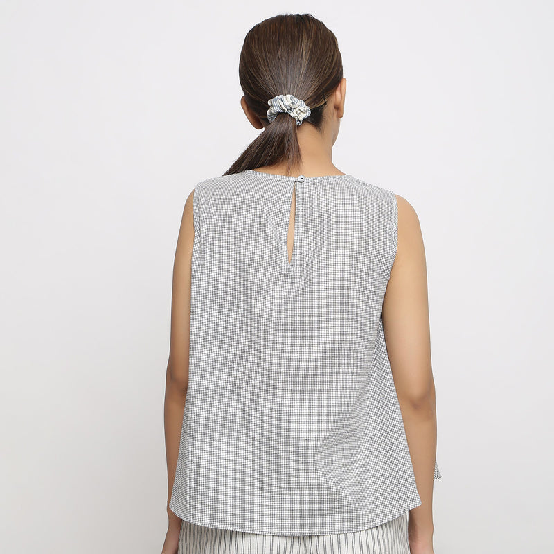 Back View of a Model wearing Off-White Cotton Checkered Flared Top