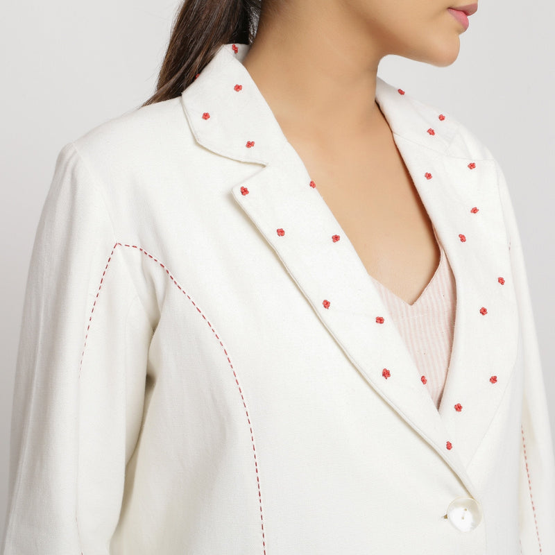 Front Detail of a Model wearing Off-White Hand Beaded Cotton Princess Line Overcoat