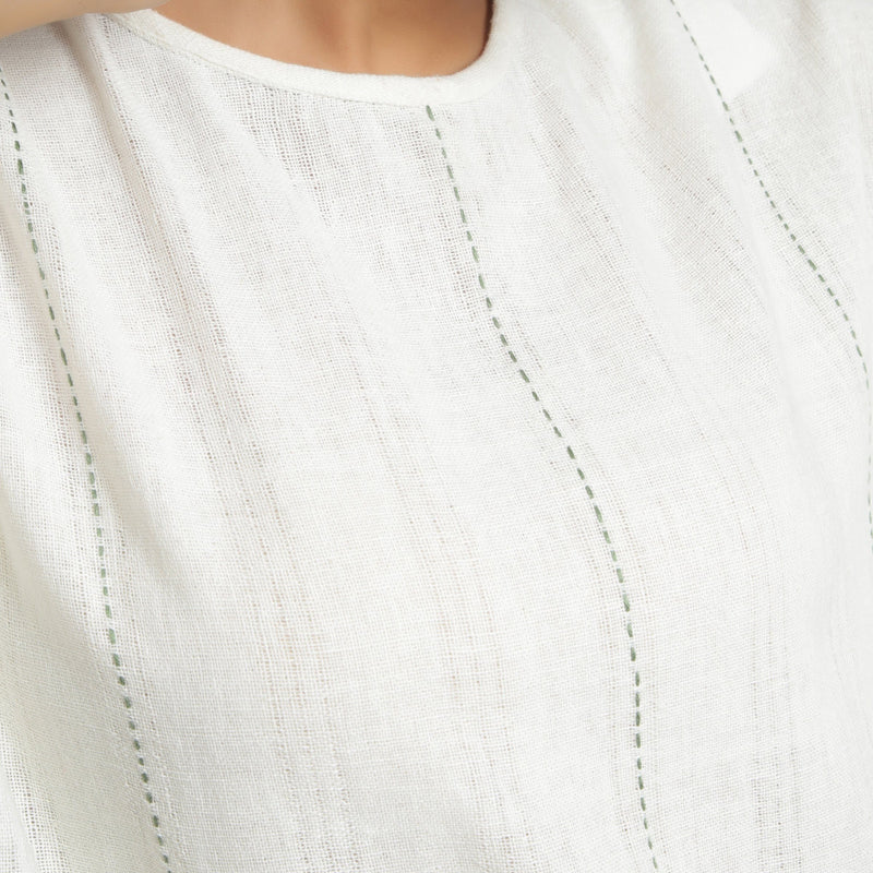 Front Detail of a Model wearing Off-White Hand Embroidered Tunic Top