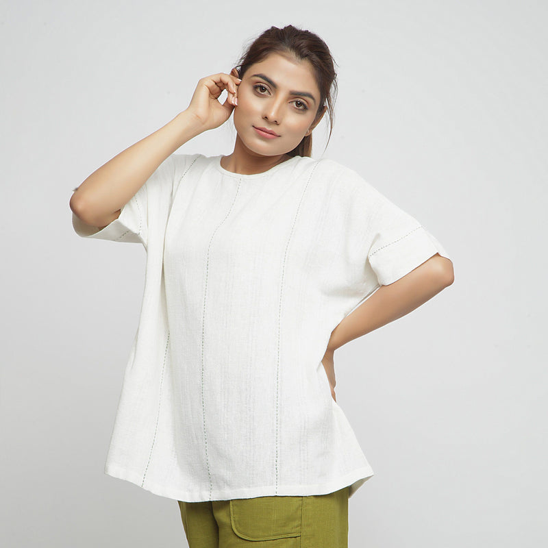 Front View of a Model wearing Off-White Hand Embroidered Tunic Top