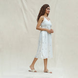 Right View of a Model wearing Off-White Aztec Handspun Cotton Jamdani Midi Slip Dress