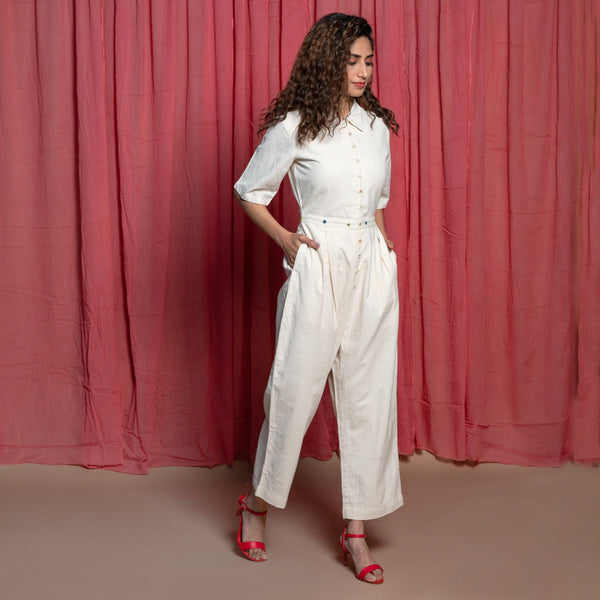 Right View of a Model wearing Off-White Embroidered Cotton Muslin High-Rise Overalls