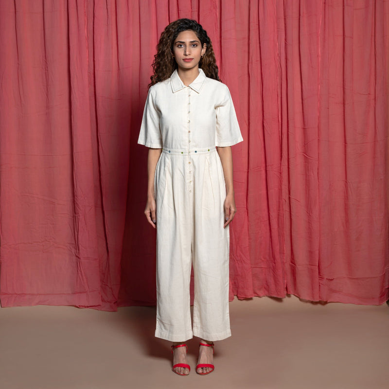 Front View of a Model wearing Off-White Embroidered Cotton Muslin High-Rise Overalls