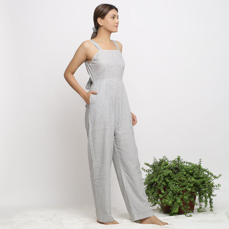 Right View of a Model wearing Off-White Handwoven Cotton Jumpsuit