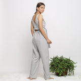 Back View of a Model wearing Off-White Handwoven Cotton Jumpsuit