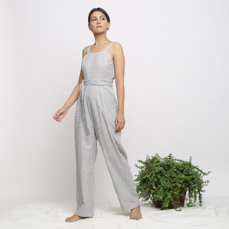 Left View of a Model wearing Off-White Handwoven Cotton Jumpsuit