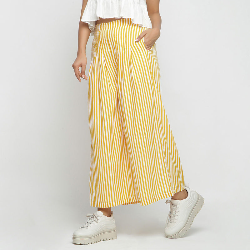 Left View of a Model wearing Yellow Striped Wide Legged Cotton Pant