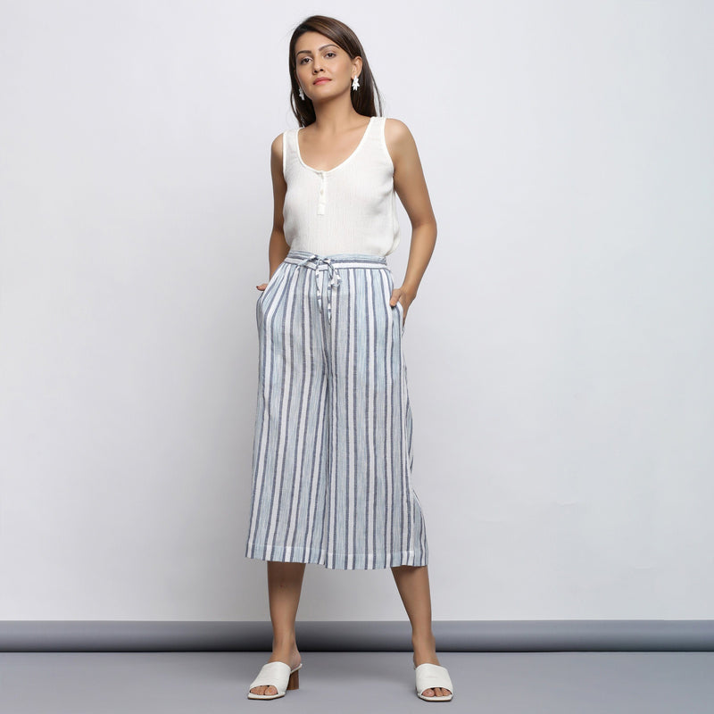 Front View of a Model wearing Off-White Straight Top and Sky Blue Culottes Set