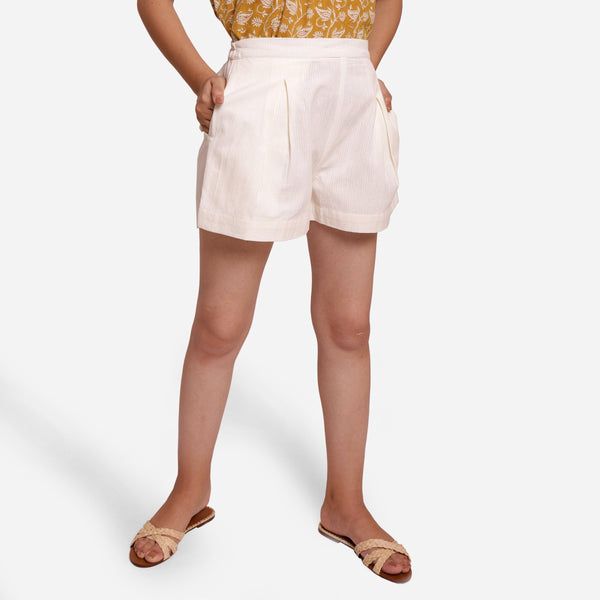 Front View of a Model wearing Off-White Striped Mid-Rise Shorts