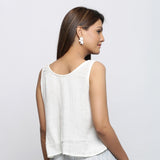 Back View of a Model Wearing Off-White Crinkled Cotton Straight Top
