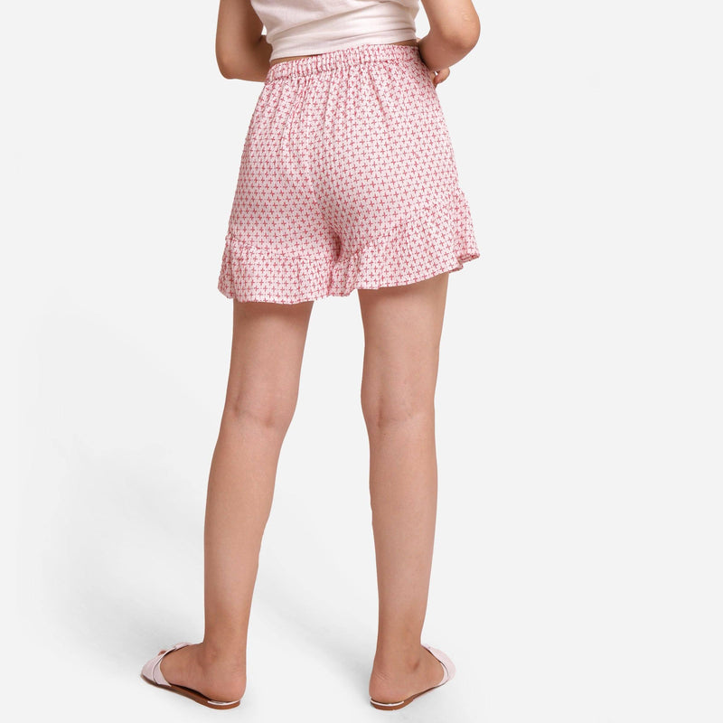 Back View of a Model wearing White Crinkled Cotton Frilled Shorts