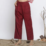 Front View of a Model Wearing Maroon Handspun Straight Fit Pant