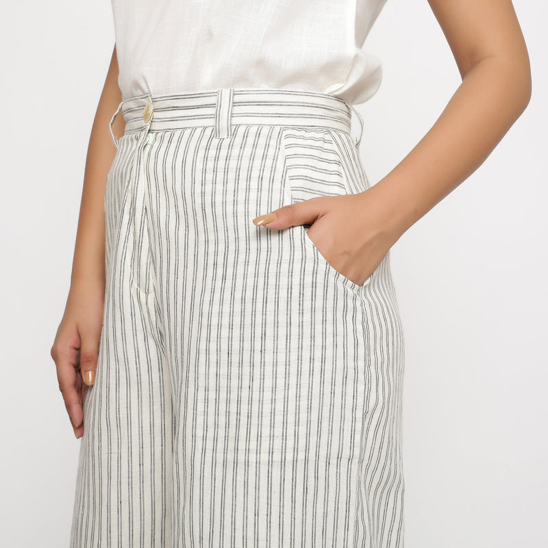 Left Detail of a Model wearing Off-White V-Neck Top and Striped Culottes Set
