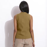 Back View of a Model wearing Olive Cotton Waffle Funnel Neck Top