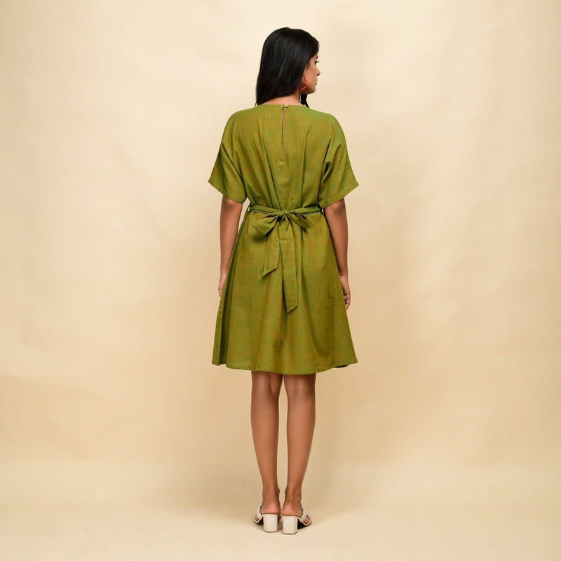 Back View of a Model wearing Olive Gold 100% Cotton Blouson Dress